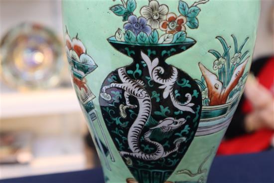 A Chinese Hundred Antiques lime green ground vase, 19th century, converted to a lamp, overall H.51.5cm